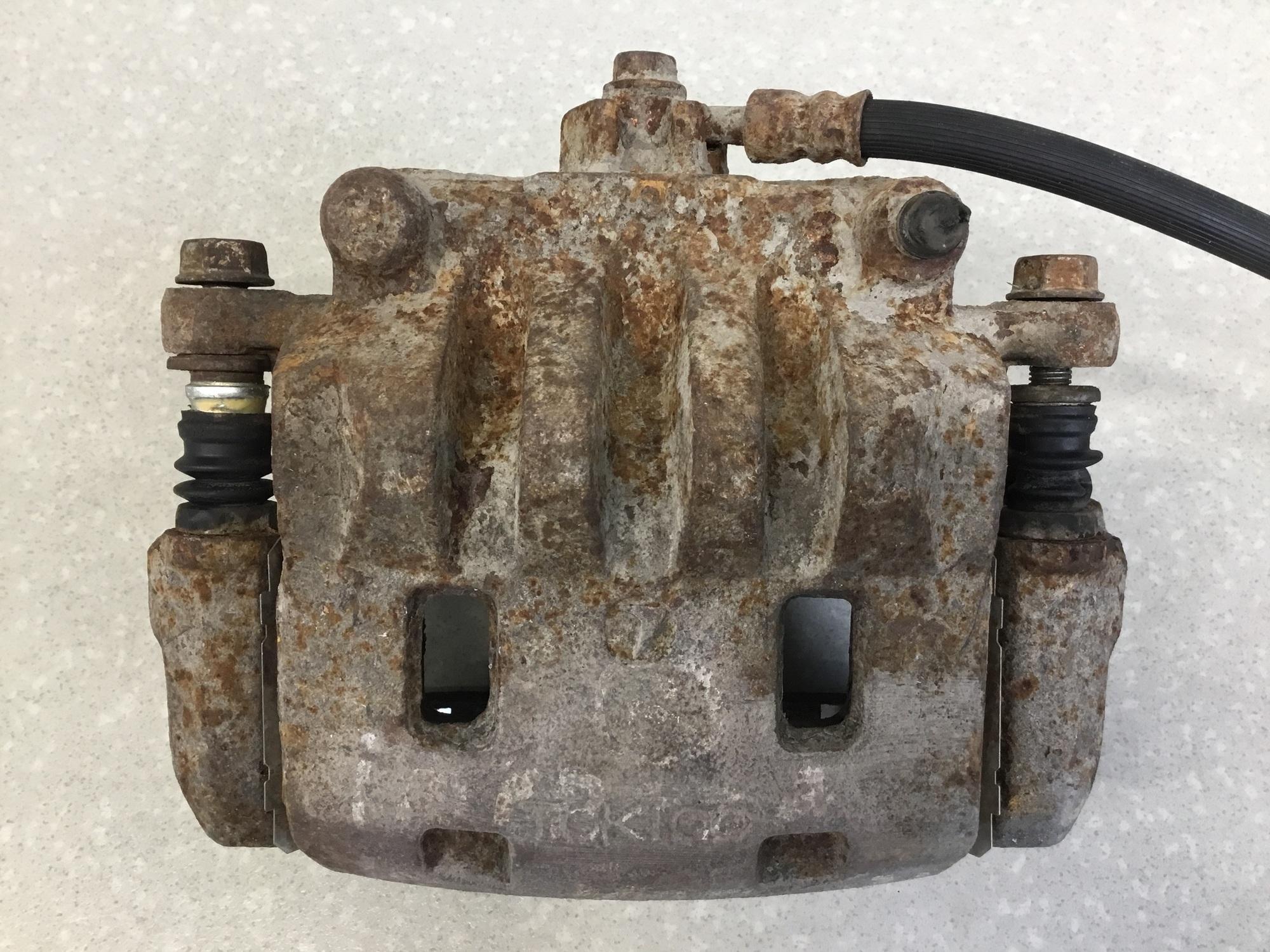 Суппорт передний правый, Subaru Impreza (G11) 2000-2007 Суппорт передний правый, Subaru Impreza (G11) 2000-2007