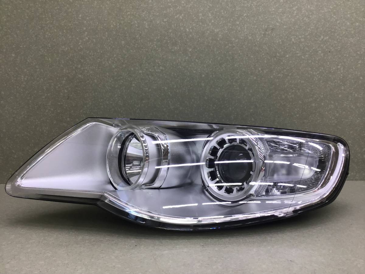 Фара левая Volkswagen Touareg (7L) 2002-2010